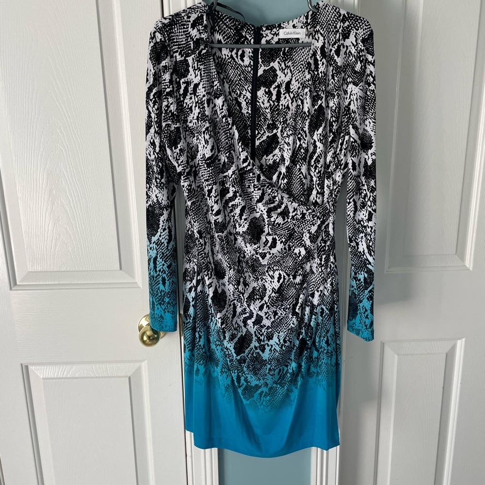 Calvin Klein size 12 wrap dress. Worn once. Black, white, and teal animal print.